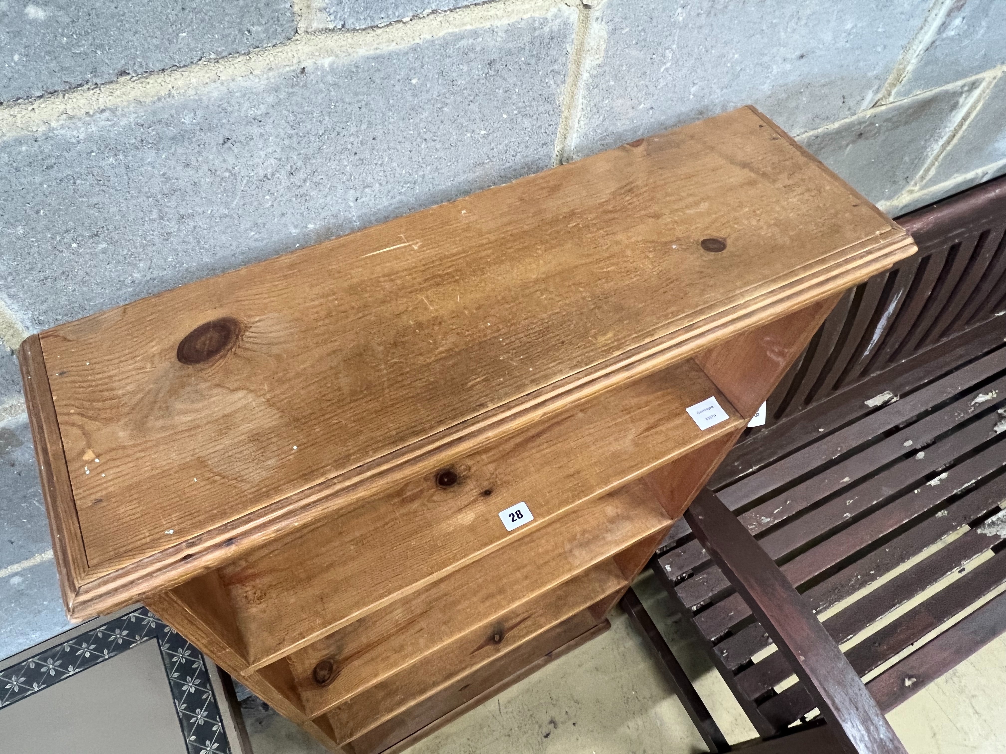 A pine open bookcase, width 66cm depth 21cm height 125cm